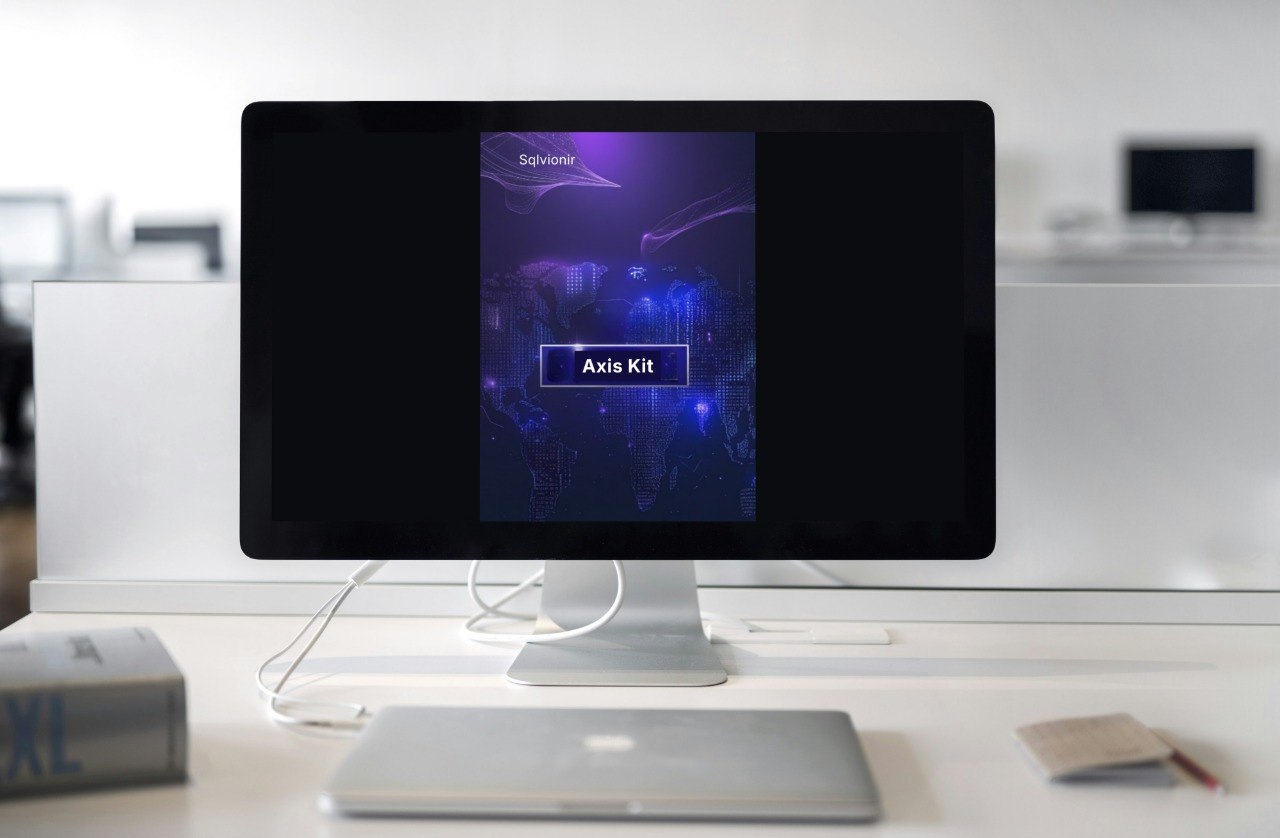 Computer monitor displaying a file sharing interface on a desk